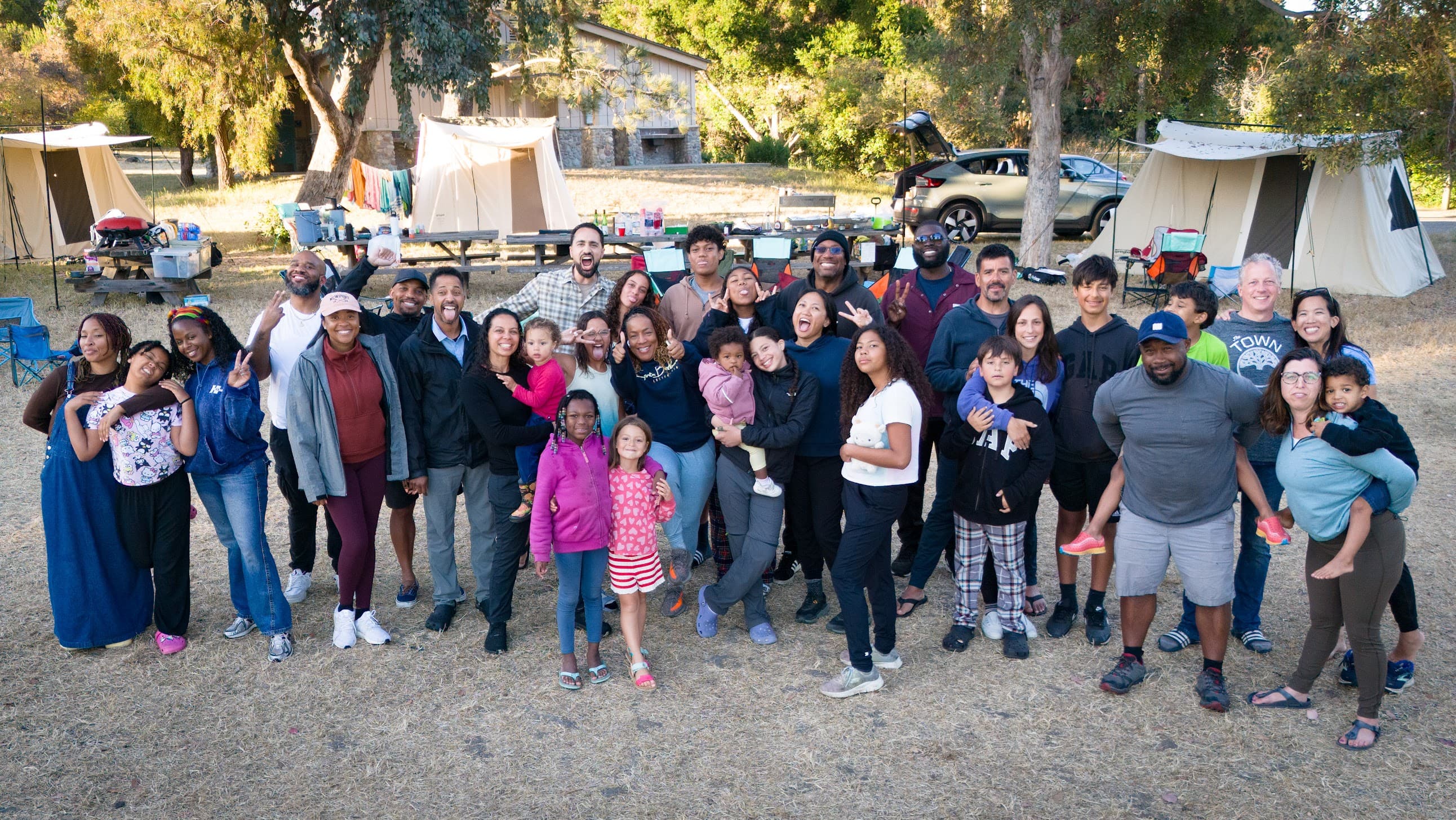 Large diverse group of Outdoorithm Collective members outdoors